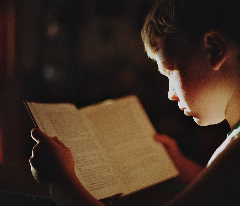 child reading stars book